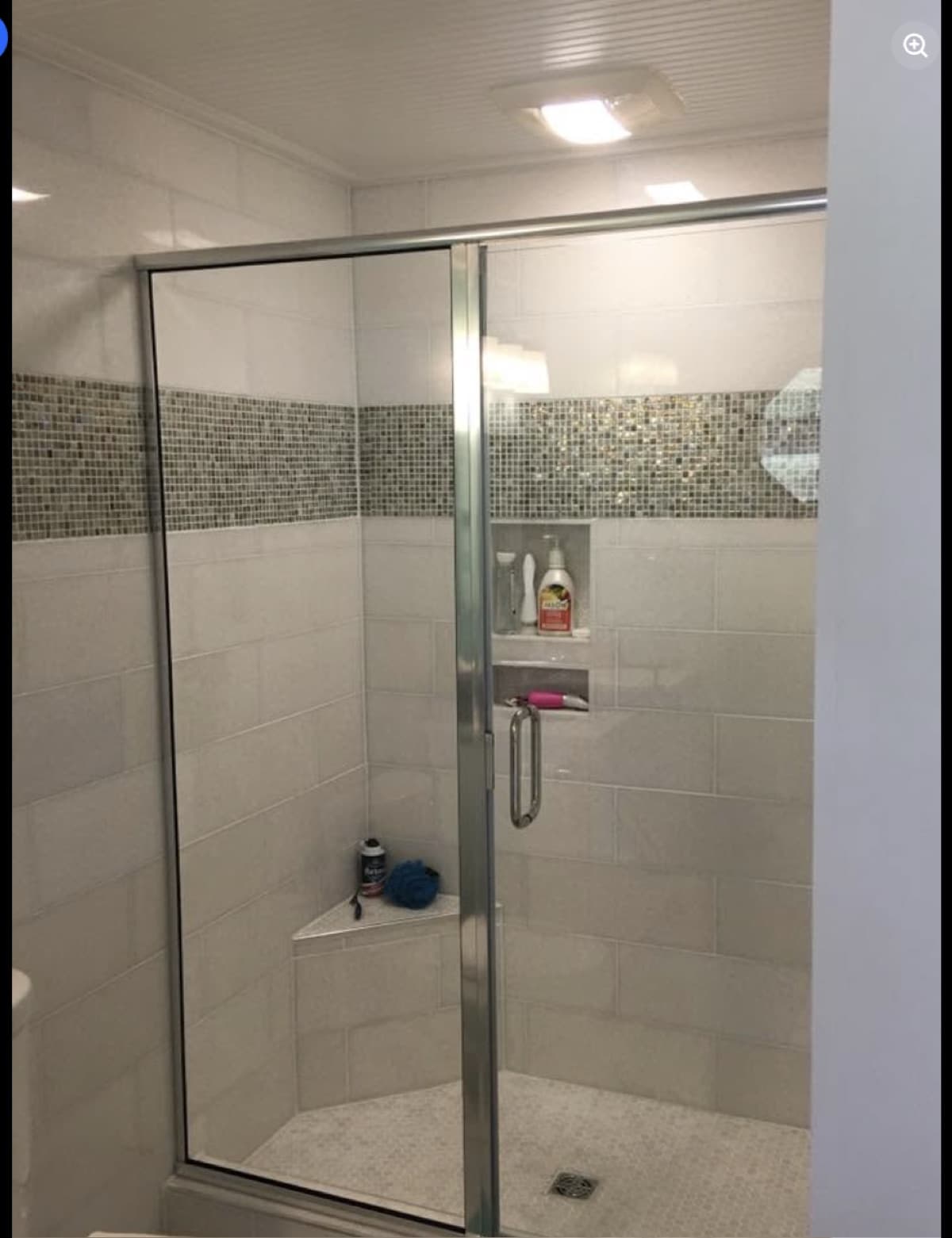 Bathroom remodel shower with mosaic tile accent band