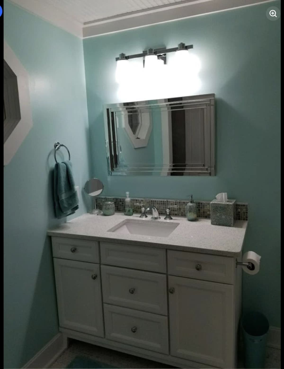 Bathroom vanity remodel with teal accent walls