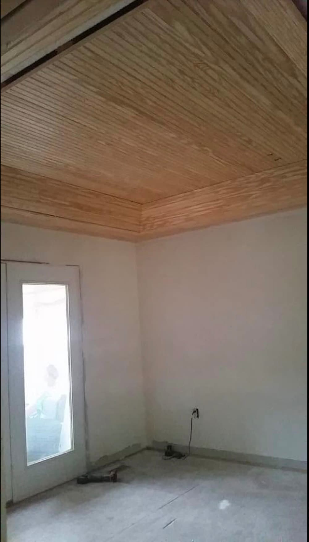 Room addition under construction with new wood ceiling