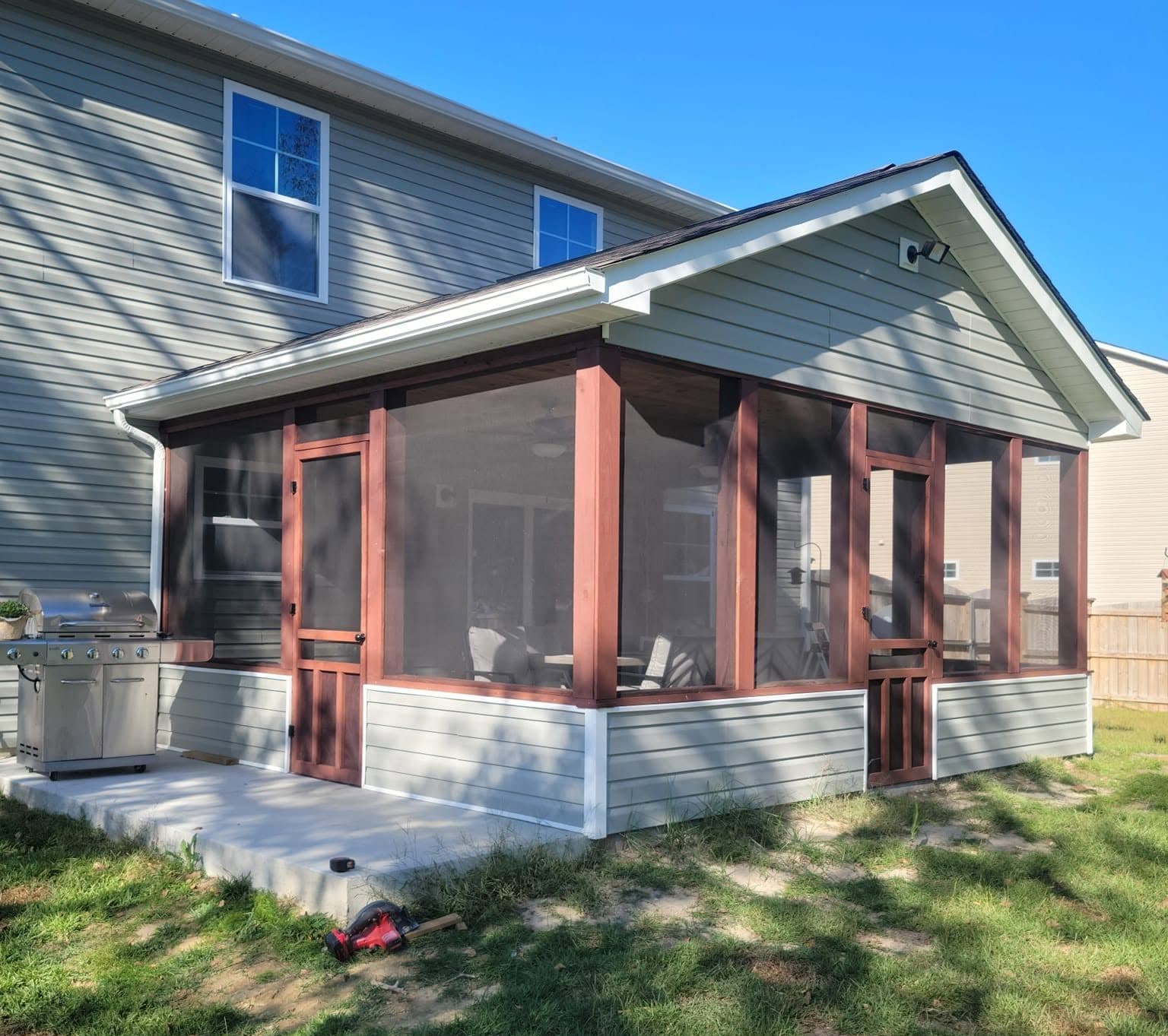 Screened in Porch on Concrete Slab with mahogony wood