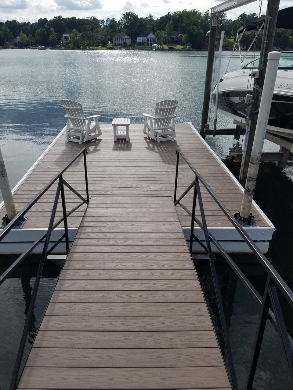 Lake Murray Boat Dock Build with white chairs